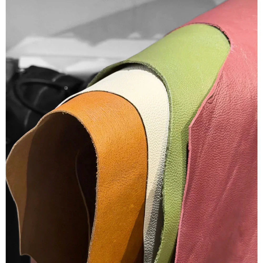 What makes full grain leather the gold standard for work handbags