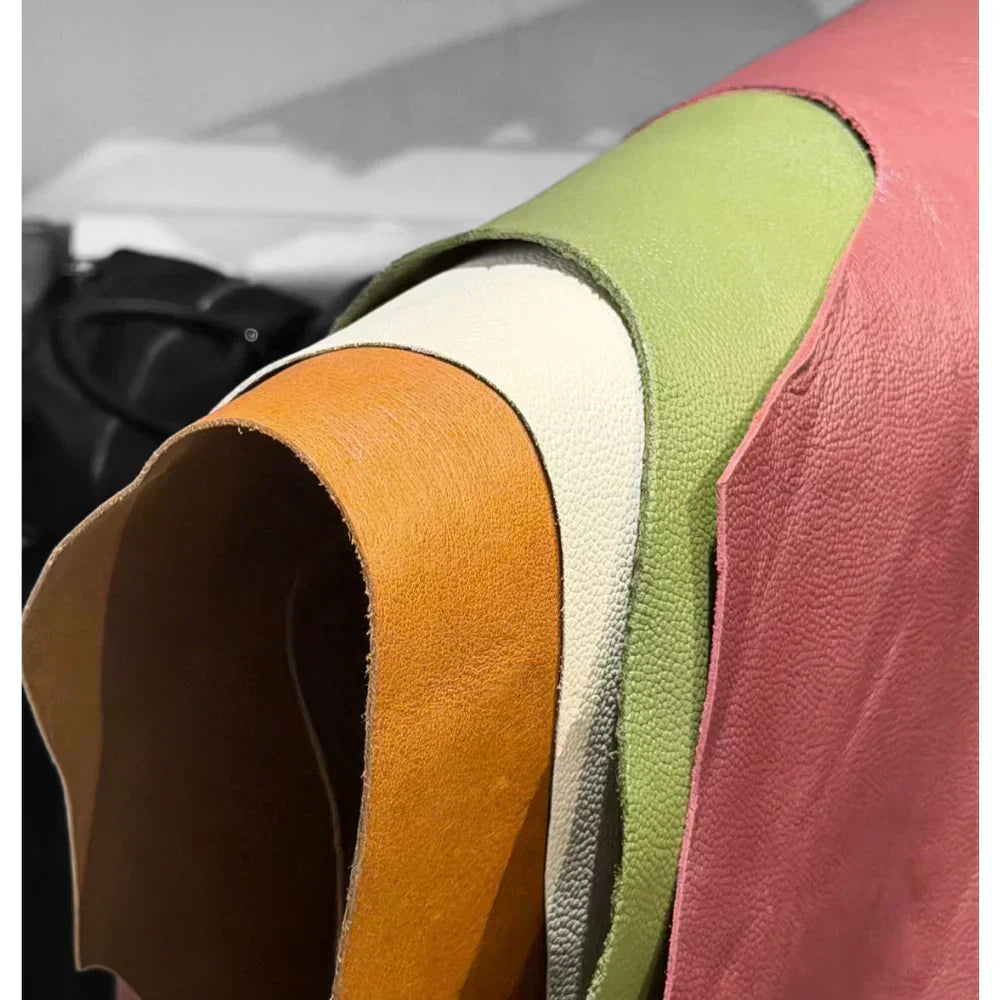 What makes full grain leather the gold standard for work handbags